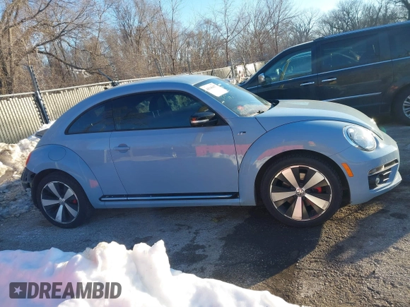 2014 Volkswagen Beetle Turbo R-Line with VIN 3VWVT7AT9EM661347, listed as a IAAI auction lot 41336295 with 61,068 mi miles and . Bid and sale history available at DreamBid. Image 13.
