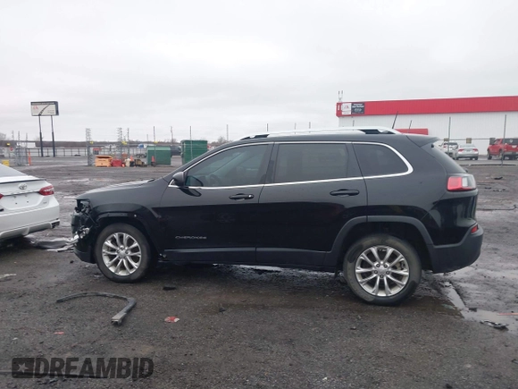 2019 Jeep Cherokee Latitude with VIN 1C4PJLCB1KD339906, listed as a IAAI auction lot 41539248 with 123,243 mi miles and . Bid and sale history available at carsss.com. Image 15.