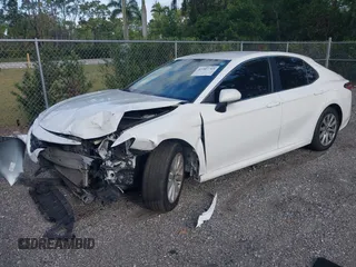 2020 Toyota Camry LE with VIN 4T1C11AK2LU950854, listed as a IAAI auction lot 41907769 with 350,007 mi miles. Bid and sale history available at carsss.com. Image 2.