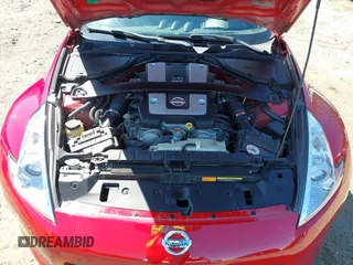2009 Nissan 370Z Touring with VIN JN1AZ44E69M405179, listed as a IAAI auction lot 41762303 with 132,853 mi miles and . Bid and sale history available at DreamBid. Image 10.