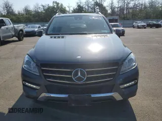 2015 Mercedes-Benz M 350 with VIN 4JGDA5HB2FA555743, listed as a Copart auction lot 65165695 with 147,152 mi miles and Salvage title. Bid and sale history available at DreamBid. Image 5.