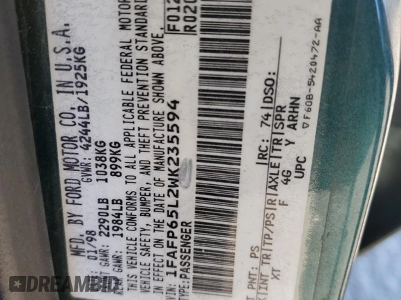 1998 Ford Contour z VIN 1FAFP65L2WK235594, wystawiony jako Copart lot #81118614 z przebiegiem 62 140 mil mil oraz Szkoda całkowita • Salvage title. Historia ofert i sprzedaży dostępna na DreamBid. Obrazek 12.