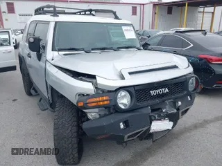 2007 Toyota FJ Cruiser with VIN JTEBU11F370036941, listed as a IAAI auction lot 42024330 with 164,703 mi miles. Bid and sale history available at carsss.com. Image 1.