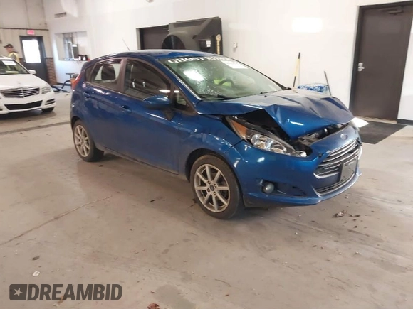 2019 Ford Fiesta SE with VIN 3FADP4EJ6KM124270, listed as a IAAI auction lot 40962134 with 122,757 mi miles. Bid and sale history available at carsss.com. Image 1.
