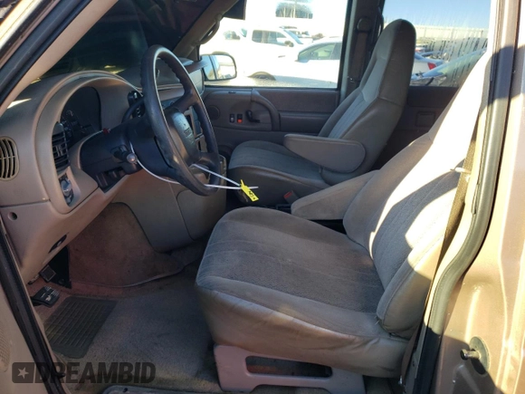 2003 GMC Safari z VIN 1GKDM19X13B513153, wystawiony jako Copart lot #80939654 z przebiegiem 177 037 mil mil oraz Czysty tytuł • Clean title. Historia ofert i sprzedaży dostępna na DreamBid. Obrazek 7.