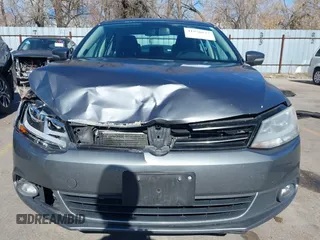 2012 Volkswagen Jetta TDI w/Premium & Nav z VIN 3VWLL7AJ5CM361646, wystawiony jako IAAI lot #41856672 z przebiegiem 190 292 mil mil oraz . Historia ofert i sprzedaży dostępna na DreamBid. Obrazek 12.