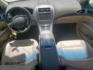 2016 Lincoln MKZ Hybrid z VIN 3LN6L2LU2GR625176, wystawiony jako Copart lot #54044385 z przebiegiem 124 861 mil mil oraz Szkoda całkowita • Salvage title. Historia ofert i sprzedaży dostępna na DreamBid. Obrazek 8.