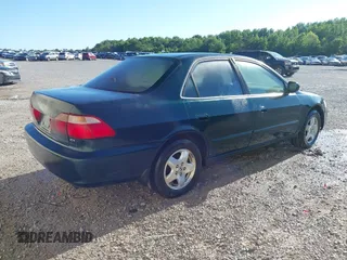 2000 Honda Accord EX z VIN 1HGCG1658YA015144, wystawiony jako IAAI lot #42303853 z przebiegiem 286 846 mil mil oraz . Historia ofert i sprzedaży dostępna na DreamBid. Obrazek 4.
