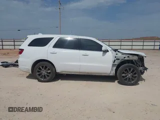 2015 Dodge Durango R/T with VIN 1C4SDJCT7FC766405, listed as a IAAI auction lot 42266645 with 61,345 mi miles and . Bid and sale history available at DreamBid. Image 14.