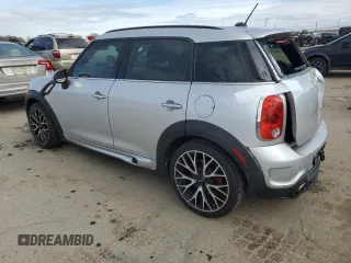 2016 MINI Countryman John Cooper Works with VIN WMWXD1C52GWT97652, listed as a Copart auction lot 49282345 with 51,983 mi miles and Salvage Title. Bid and sale history available at DreamBid. Image 2.