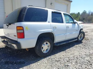 2003 GMC Yukon SLT with VIN 1GKEC13Z33R171861, listed as a IAAI auction lot 41739226 with 230,139 mi miles. Bid and sale history available at carsss.com. Image 4.