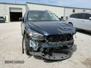 2016 Mazda CX-5 Grand Touring with VIN JM3KE4DYXG0844002, listed as a Copart auction lot 52712035 with 81,042 mi miles and Salvage Title. Bid and sale history available at DreamBid. Image 12.