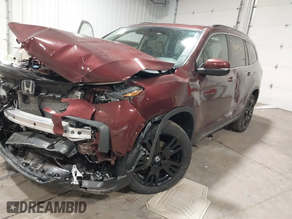 2022 Honda Pilot Special Edition with VIN 5FNYF6H23NB027017, listed as a IAAI auction lot 41953810 with 23,422 mi miles and . Bid and sale history available at DreamBid. Image 18.