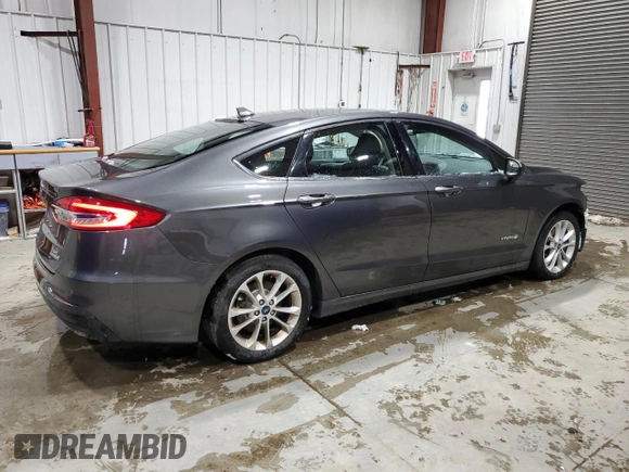 2019 Ford Fusion Hybrid SE with VIN 3FA6P0LU3KR226935, listed as a Copart auction lot 52020695 with 119,153 mi miles and Salvage Title. Bid and sale history available at carsss.com. Image 3.