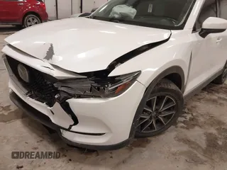 2018 Mazda CX-5 S Premium with VIN JM3KFBDM1J1412088, listed as a IAAI auction lot 41497431 with 65,532 mi miles and . Bid and sale history available at DreamBid. Image 6.