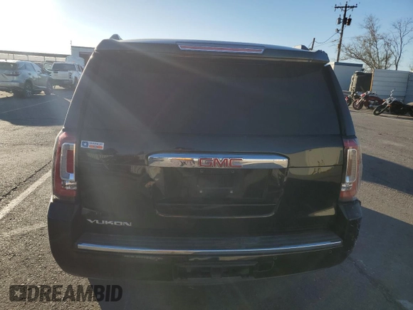 2018 GMC Yukon Denali with VIN 1GKS1CKJ0JR106589, listed as a Copart auction lot 79977034 with 98,022 mi miles and Salvage Title. Bid and sale history available at carsss.com. Image 6.