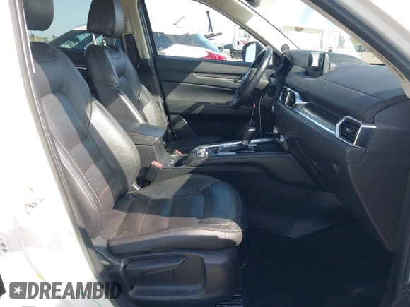 2017 Mazda CX-5 Grand Touring with VIN JM3KFADLXH0222341, listed as a IAAI auction lot 41990464 with 94,374 mi miles and . Bid and sale history available at carsss.com. Image 5.