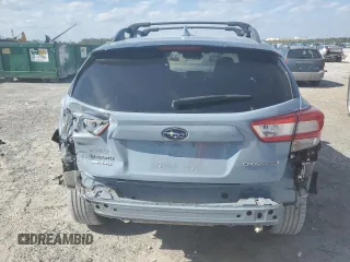 2018 Subaru Crosstrek Premium z VIN JF2GTADC6J8259659, wystawiony jako Copart lot #52709645 z przebiegiem 98 335 mil mil oraz Szkoda całkowita • Salvage title. Historia ofert i sprzedaży dostępna na DreamBid. Obrazek 6.