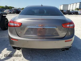 2014 Maserati Ghibli S Q4 z VIN ZAM57RTA6E1090293, wystawiony jako Copart lot #57298875 z przebiegiem 113 805 mil mil oraz Tytuł czysty. Historia ofert i sprzedaży dostępna na DreamBid. Obrazek 6.