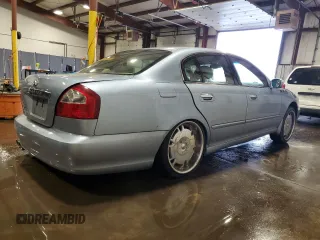 2002 Infiniti Q45 z VIN JNKBF01A62M002926, wystawiony jako Copart lot #73206924 z przebiegiem Nie podano mil oraz Szkody całkowita. Historia ofert i sprzedaży dostępna na DreamBid. Obrazek 3.