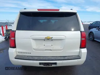 2015 Chevrolet Suburban LT with VIN 1GNSKJKC0FR309866, listed as a IAAI auction lot 41743848 with 220,778 mi miles and . Bid and sale history available at DreamBid. Image 16.