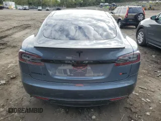 2014 Tesla Model S 60 with VIN 5YJSA1H14EFP28471, listed as a Copart auction lot 73715834 with 99,442 mi miles and Clean Title. Bid and sale history available at DreamBid. Image 6.