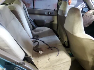 1996 Toyota Tercel DX z VIN JT2BC52L7T7044201, wystawiony jako Copart lot #77190074 z przebiegiem Nie podano mil oraz Szkoda całkowita • Salvage title. Historia ofert i sprzedaży dostępna na DreamBid. Obrazek 11.