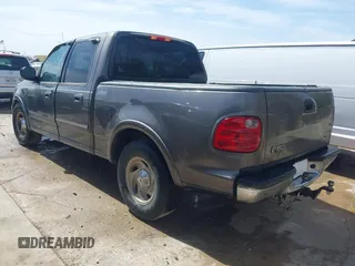 2003 Ford F-150 XLT with VIN 1FTRW076X3KA76379, listed as a IAAI auction lot 41821131 with 221,081 mi miles. Bid and sale history available at carsss.com. Image 3.