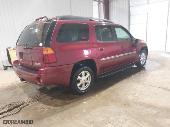 2006 GMC Envoy XL SLE with VIN 1GKET16S666128975, listed as a IAAI auction lot 41303944 with 292,318 mi miles. Bid and sale history available at carsss.com. Image 4.