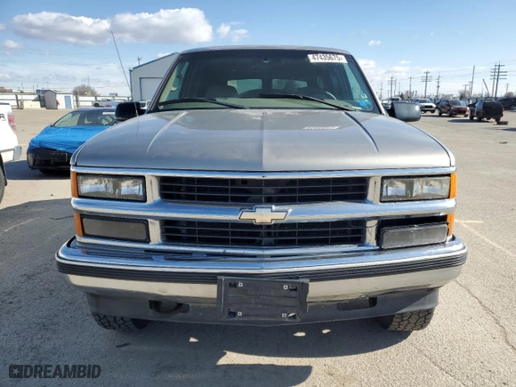 1999 Chevrolet Tahoe Z71 with VIN 1GNEK13R4XJ458295, listed as a Copart auction lot 47435675 with 211,422 mi miles and Salvage Title. Bid and sale history available at carsss.com. Image 5.