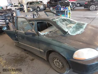 1996 Honda Civic DX with VIN 1HGEJ6625TL019386, listed as a IAAI auction lot 40775179 with 212,267 mi miles. Bid and sale history available at carsss.com. Image 14.