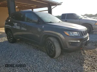 2019 Jeep Compass Trailhawk with VIN 3C4NJDDB5KT722026, listed as a Copart auction lot 52824885 with 105,727 mi miles and Salvage title. Bid and sale history available at DreamBid. Image 4.