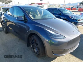 2022 Tesla Model Y Performance with VIN 7SAYGDEF7NF562895, listed as a IAAI auction lot 41692864 with 29,904 mi miles and . Bid and sale history available at DreamBid. Image 1.