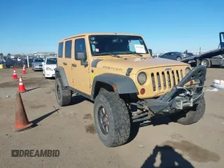 2013 Jeep Wrangler Unlimited Rubicon with VIN 1C4BJWFG3DL632668, listed as a IAAI auction lot 41751546 with 153,149 mi miles. Bid and sale history available at carsss.com. Image 1.