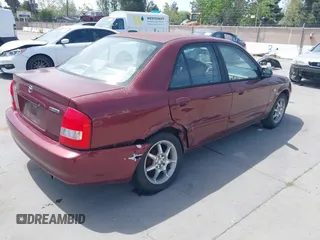 2002 Mazda Protege DX with VIN JM1BJ225621608984, listed as a IAAI auction lot 42106167 with 158,662 mi miles and . Bid and sale history available at DreamBid. Image 4.