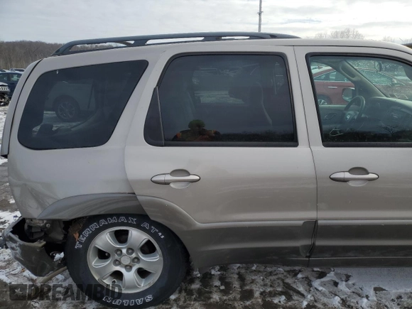 2001 Mazda Tribute LX with VIN 4F2CU081X1KM70119, listed as a Copart auction lot 89311935 with 176,851 mi miles and Salvage Title. Bid and sale history available at DreamBid. Image 11.