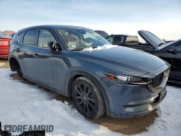 2021 Mazda CX-5 Touring with VIN JM3KFBCM0M0395988, listed as a Copart auction lot 45539925 with 39,889 mi miles and Salvage Title. Bid and sale history available at carsss.com. Image 4.