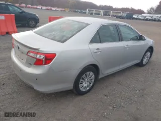 2012 Toyota Camry Hybrid XLE with VIN 4T1BD1FK4CU016397, listed as a IAAI auction lot 40642360 with 118,975 mi miles. Bid and sale history available at carsss.com. Image 4.