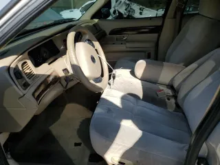 2007 Mercury Grand Marquis GS with VIN 2MEFM74V57X603310, listed as a Copart auction lot 70229064 with 119,536 mi miles and Salvage Title. Bid and sale history available at carsss.com. Image 7.