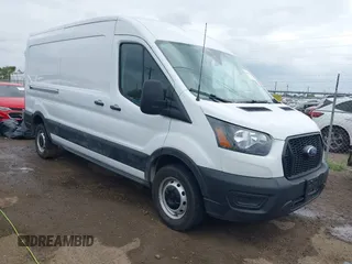 2023 Ford Transit Cargo with VIN 1FTBR1C8XPKC07063, listed as a IAAI auction lot 42103484 with 12,946 mi miles. Bid and sale history available at carsss.com. Image 1.