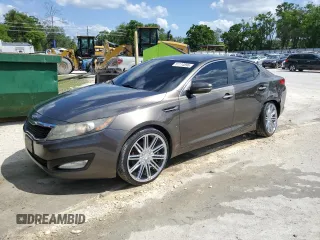 2012 Kia Optima EX with VIN 5XXGN4A74CG028745, listed as a Copart auction lot 51114895 with 198,809 mi miles and Salvage Title. Bid and sale history available at carsss.com. Image 1.