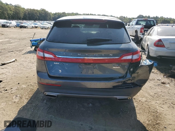 2018 Lincoln MKX Premiere z VIN 2LMPJ8JR7JBL38566, wystawiony jako Copart lot #70669944 z przebiegiem 69 860 mil mil oraz Szkoda całkowita • Salvage title. Historia ofert i sprzedaży dostępna na DreamBid. Obrazek 6.