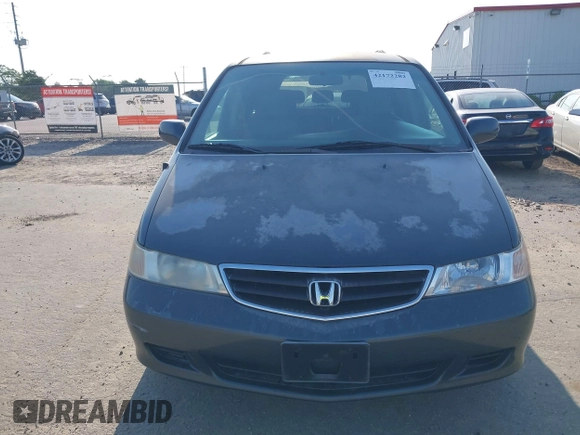 2003 Honda Odyssey EX with VIN 5FNRL18673B112958, listed as a IAAI auction lot 42172282 with 189,521 mi miles and . Bid and sale history available at DreamBid. Image 13.