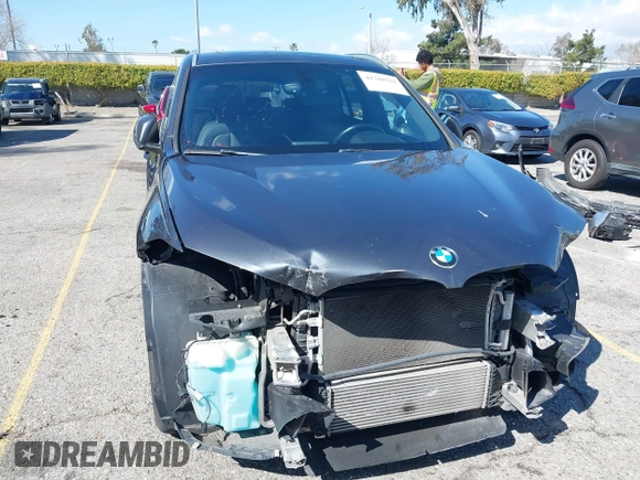 2018 BMW X1 sDrive28i with VIN WBXHU7C36J5L05628, listed as a IAAI auction lot 41708522 with 91,352 mi miles and . Bid and sale history available at DreamBid. Image 13.