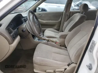 2000 Mazda 626 LX with VIN 1YVGF22CXY5112958, listed as a Copart auction lot 72740904 with 111,581 mi miles and Clean Title. Bid and sale history available at carsss.com. Image 7.