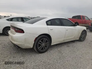 2019 Dodge Charger SXT with VIN 2C3CDXJG3KH758049, listed as a Copart auction lot 47238915 with 97,995 mi miles and Salvage Title. Bid and sale history available at DreamBid. Image 3.