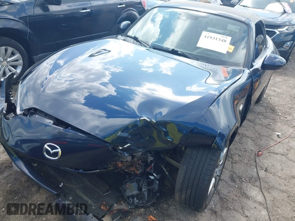 2021 Mazda MX-5 Miata Grand Touring с VIN JM1NDAD79M0457032, выставлен на аукционе IAAI как лот 41931348 с пробегом 47 874 миль миль и . История ставок и продаж доступна на DreamBid. Изображение 6.
