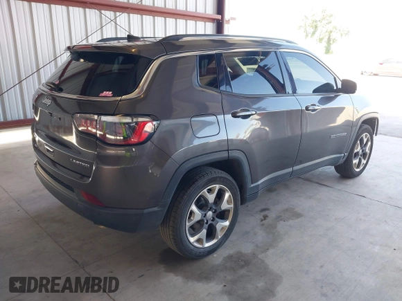 2021 Jeep Compass Limited with VIN 3C4NJDCB4MT565268, listed as a IAAI auction lot 41989761 with 97,368 mi miles and . Bid and sale history available at DreamBid. Image 4.