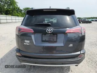 2016 Toyota RAV4 SE z VIN JTMJFREV0GD177498, wystawiony jako Copart lot #60571225 z przebiegiem 88 396 mil mil oraz Szkoda całkowita • Salvage title. Historia ofert i sprzedaży dostępna na DreamBid. Obrazek 6.