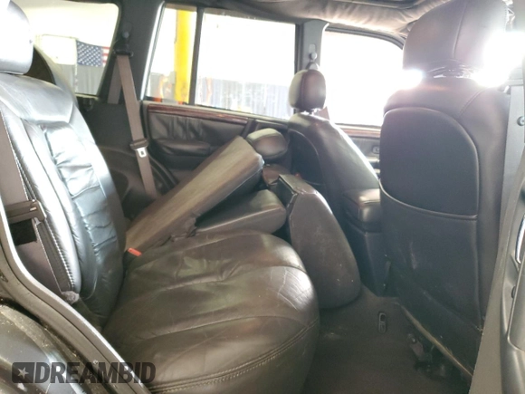 1998 Jeep Grand Cherokee Limited z VIN 1J4GZ88Z0WC276394, wystawiony jako Copart lot #46702355 z przebiegiem 144 232 mil mil oraz Szkoda całkowita • Salvage title. Historia ofert i sprzedaży dostępna na DreamBid. Obrazek 10.